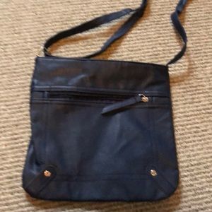 Navy blue cross body purse.
